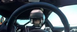 Мэтт Пауэрс-на Ford Mustang в гарнитуре виртуальной реальности Oculus Rift